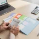 Business owner reviewing job cost reports at a desk
